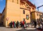 Patrons from Bar Bistec Gather in the plaza at Triana's Iglesia de Santa Ana